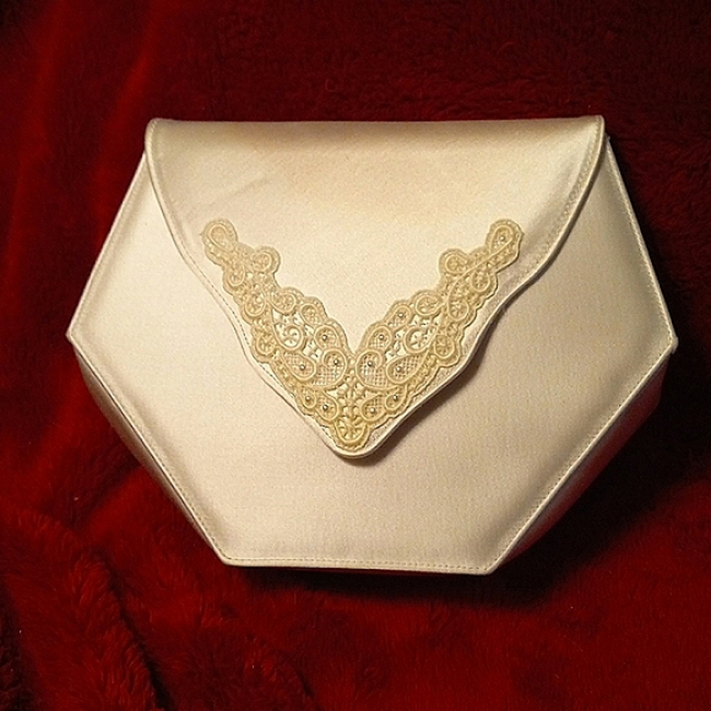 Stuart Weitzman white silk evening bag with a lace beaded appliqué on front flap